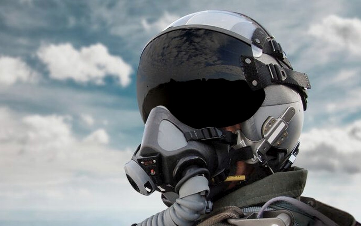 Fixed-wing aircrew helmet with dark visor and oxygen mask fitted